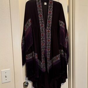 Purple Shrug with Dramatic Draping and Geometric Borders